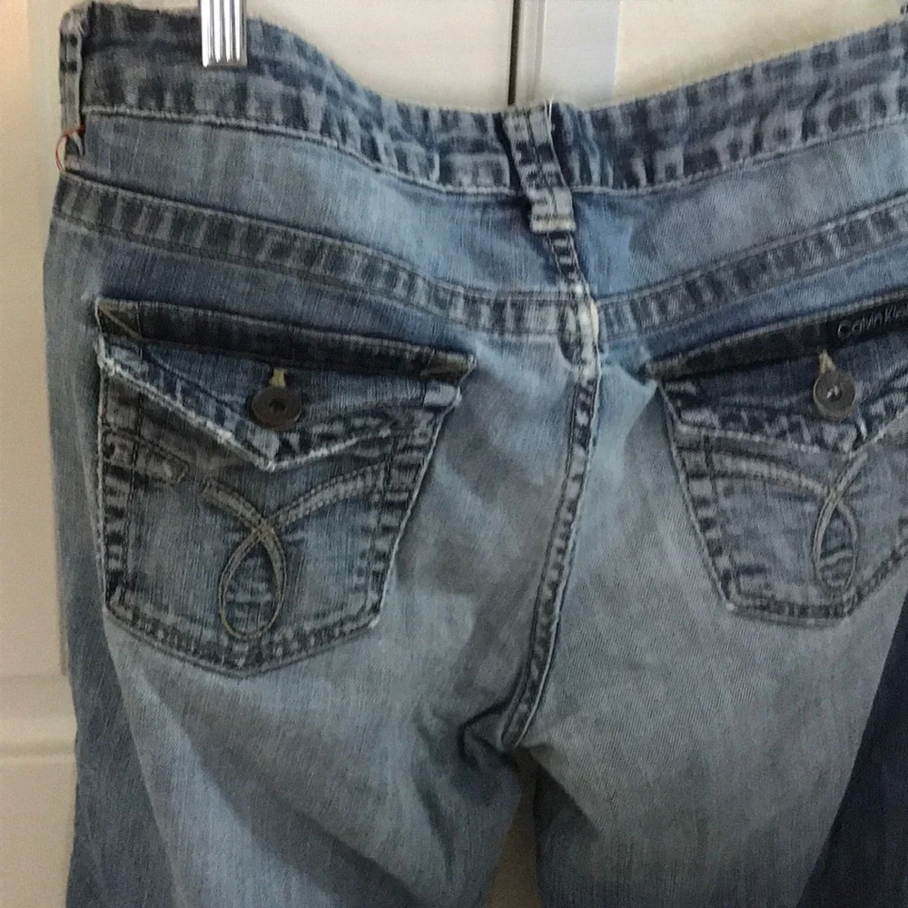 Calvin Klein distressed medium dark wash jeans 10